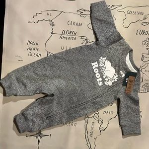 Roots Baby - 0-3 months, new with tags. Original salt and pepper.